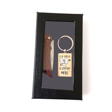 Estuche con navaja y llavero de frases