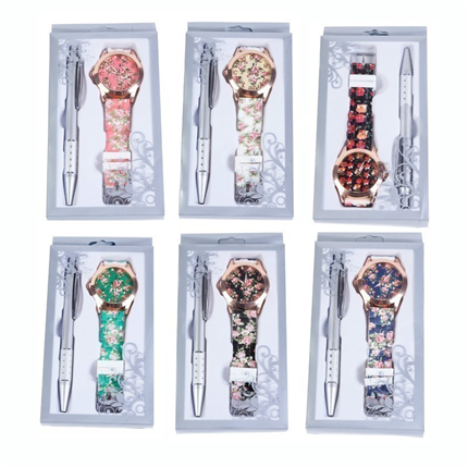 Reloj floral con bolígrafo en caja