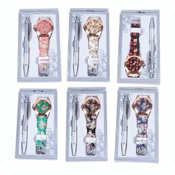 Reloj floral con bolígrafo en caja